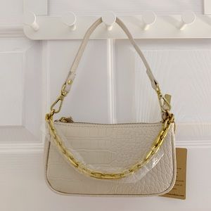 Mini bag with gold chain in cream